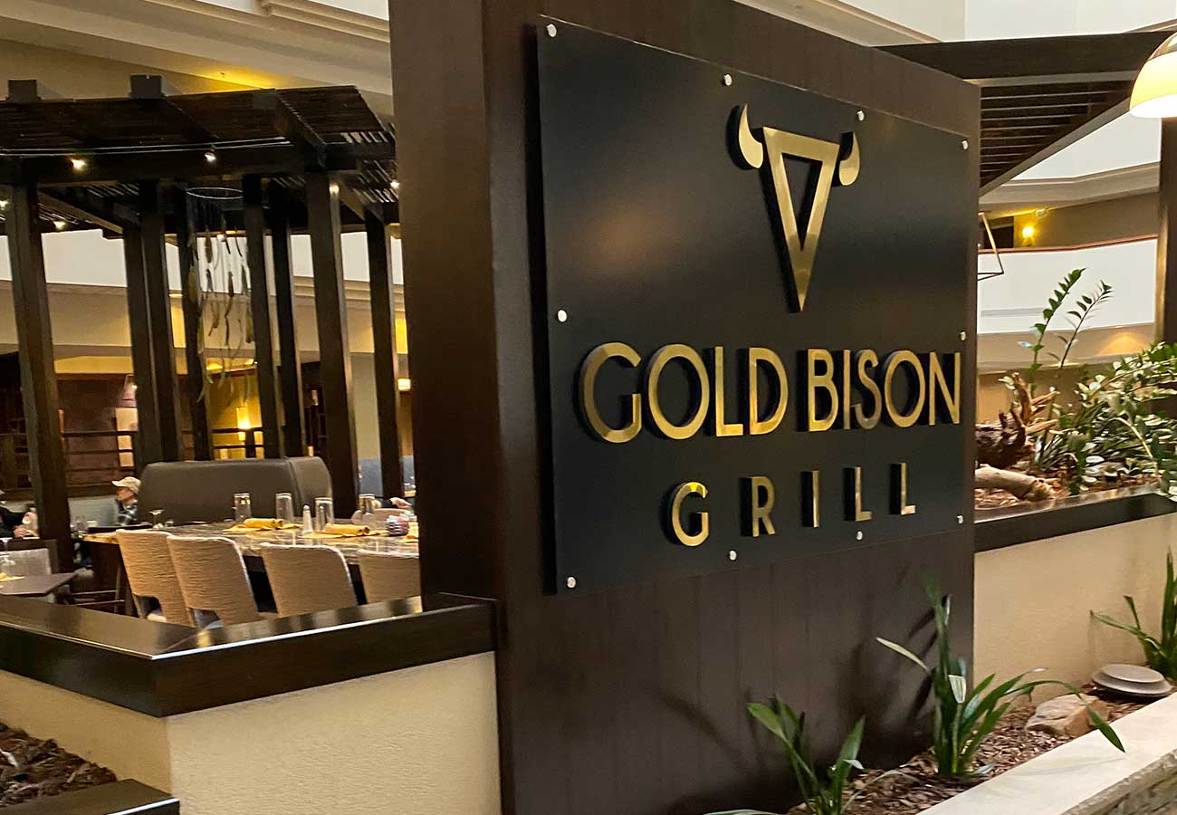 gold bison sign