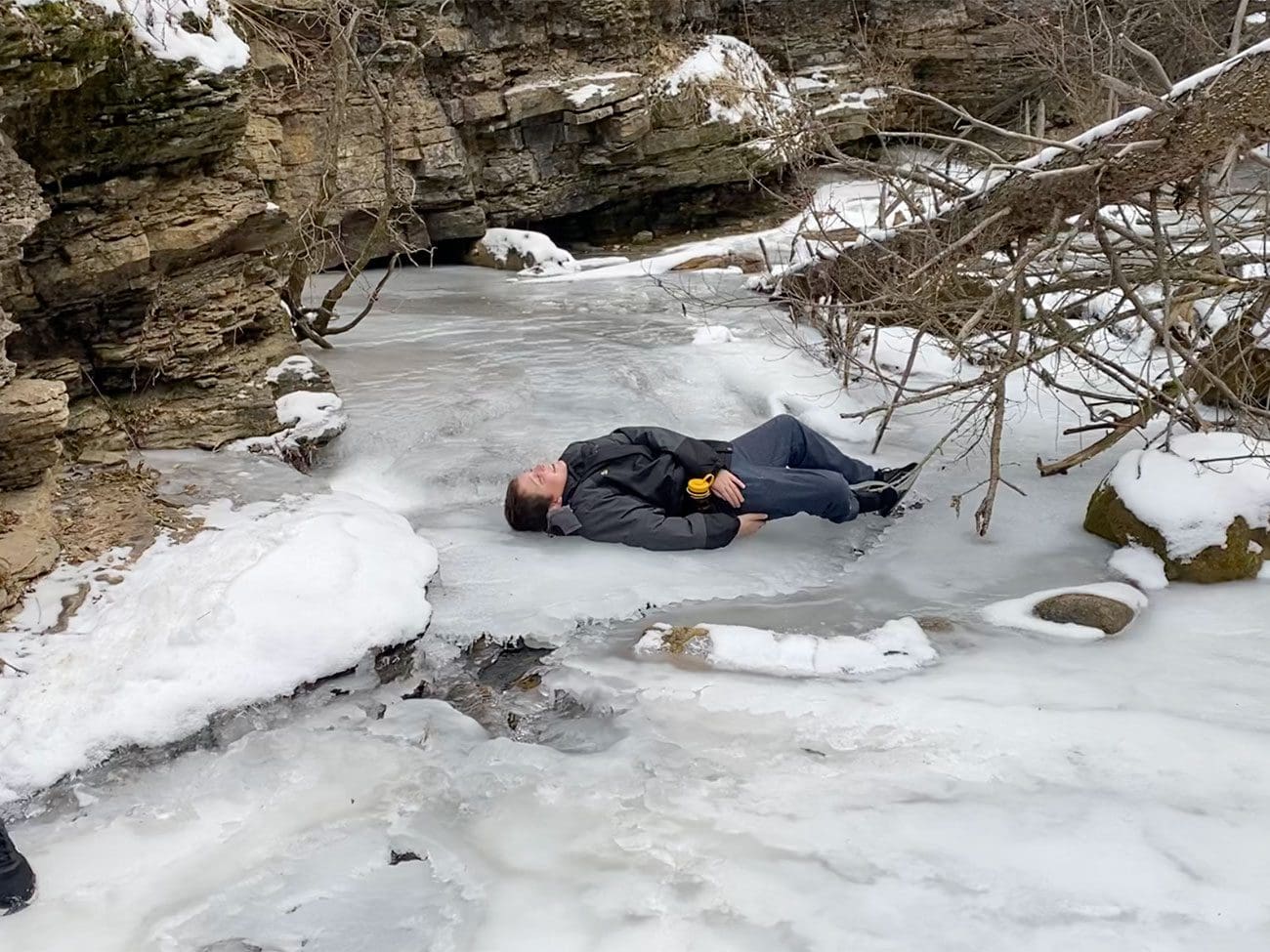boy falls on icy creek