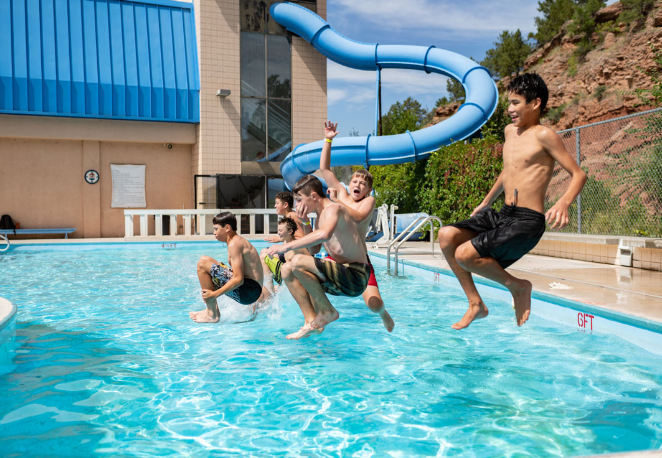Evan's Plunge Boys Jumping Into Pool