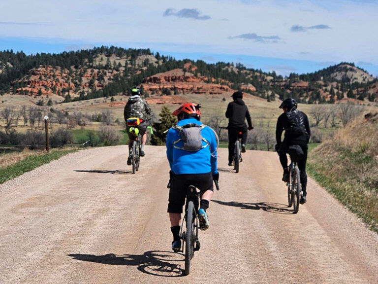 black-hills-bike-hub-rapid-city-group-of-bicyclists-on-gravel-road