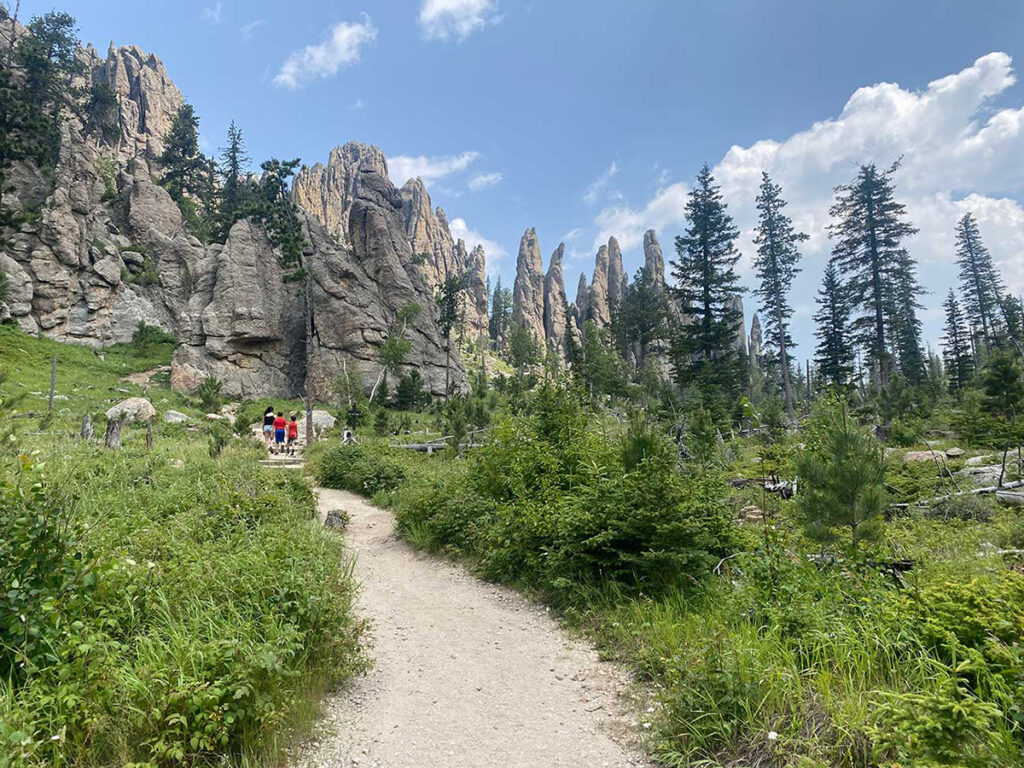 Cathedral Spires Trail in Custer State Park. View of path and rock formations.