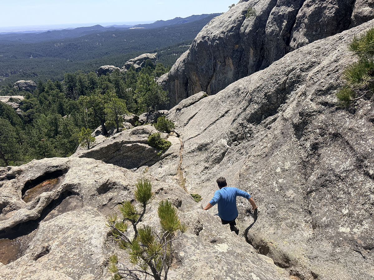 Trail through a groove in the rock on Mount Baldy Trail near Keystone, SD