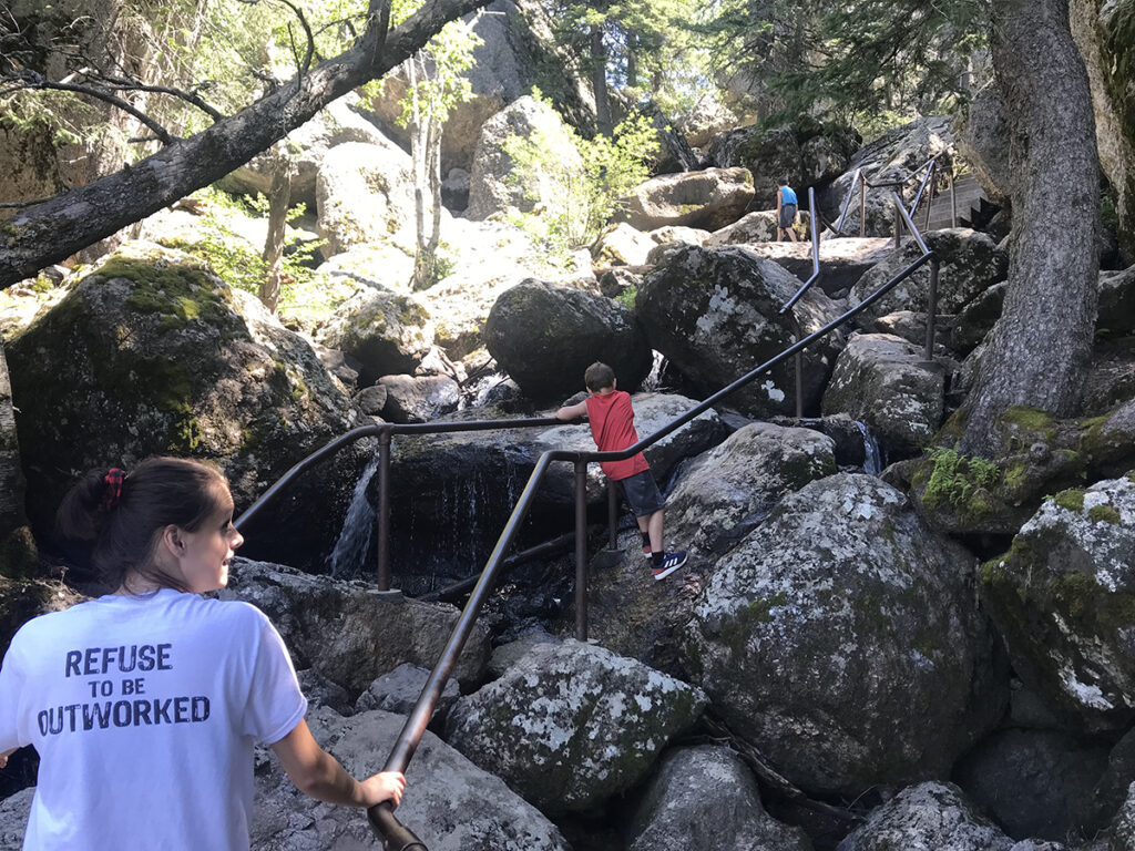 Sunday Gulch Trail in Custer State Park. Climbing boulders with help from a permanent rail