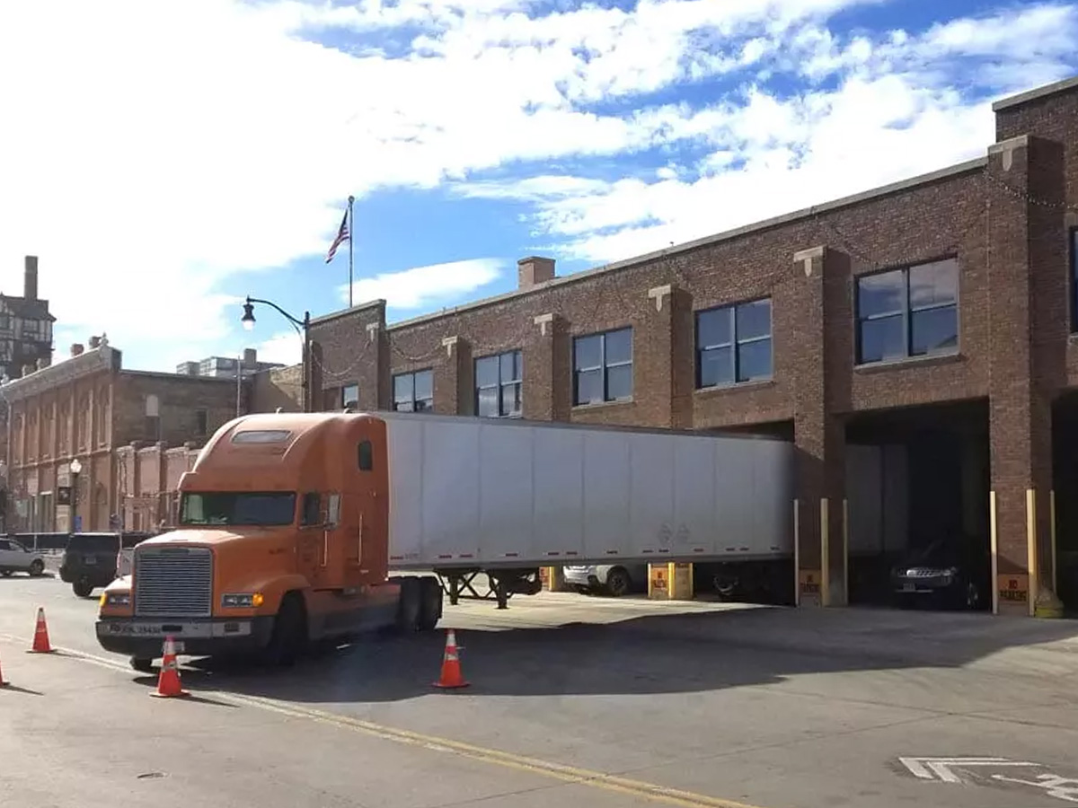 North Western Warehouse, Rapid City, truck unloading at warehouse dock