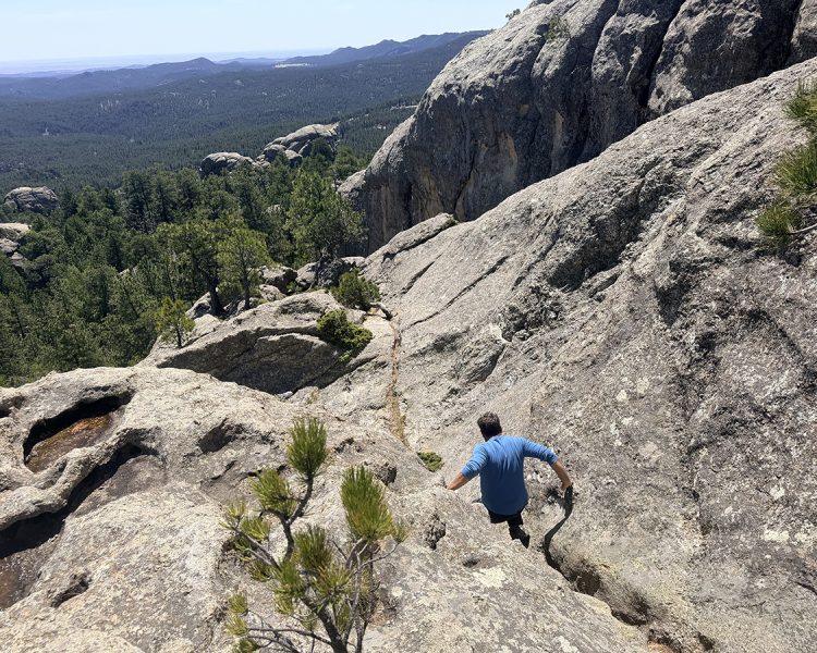 Trail through a groove in the rock on Mount Baldy Trail near Keystone, SD