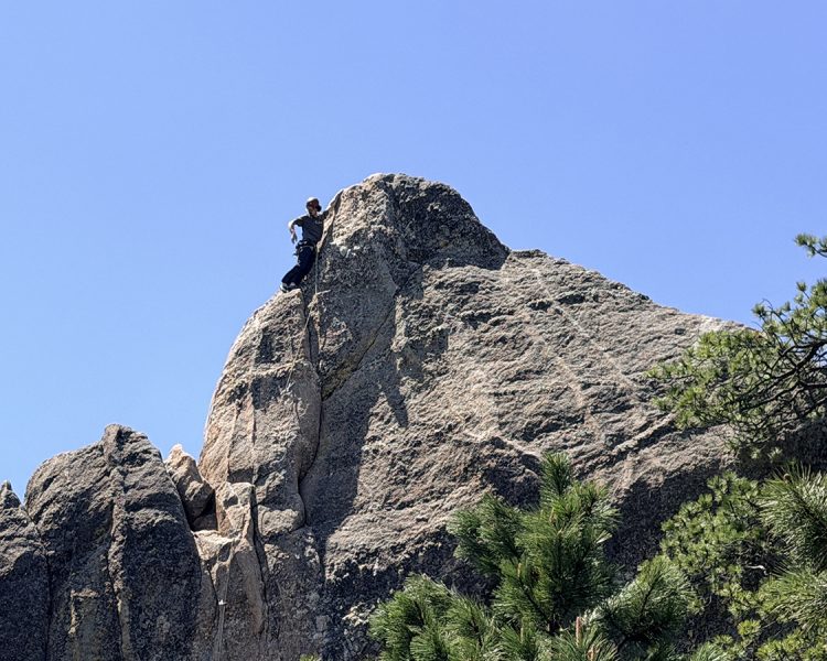 Rock climber at Mount Baldy Trail near Keystone, SD