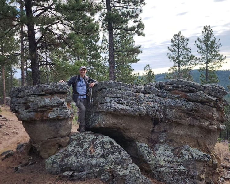 steven hiking in rocks